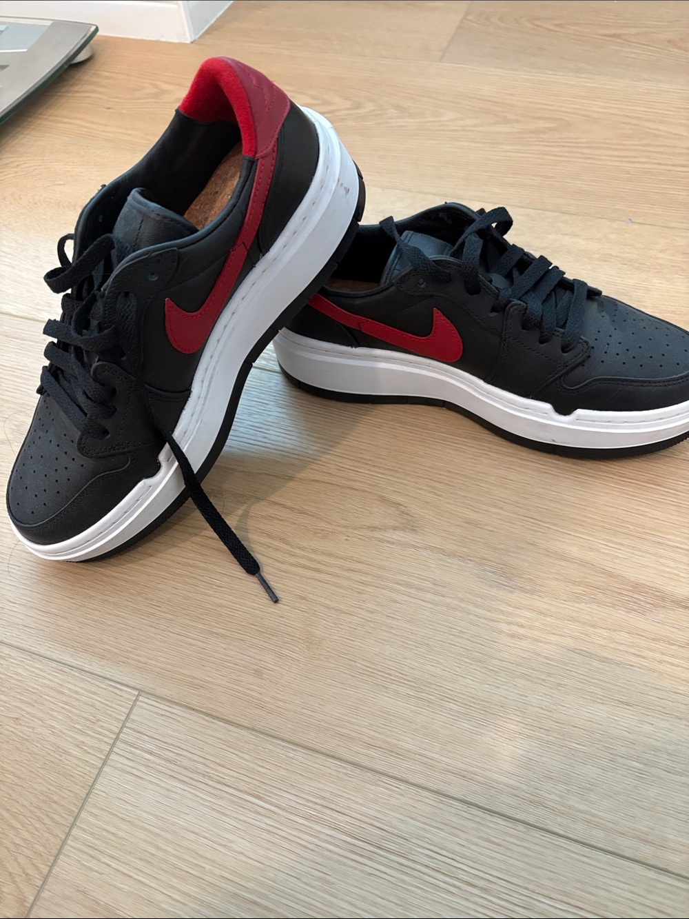 Nike Jordans women’s  Black and Red Low-Top Sneakers